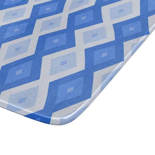 Schaduwen van blauw diamantpatroon snijplank (Hoek)