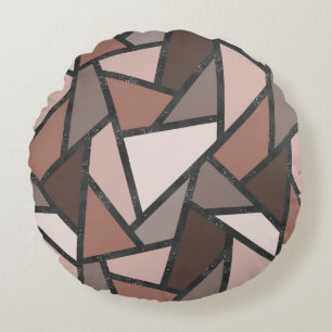 Schaduwen van bruin gekleurd glas rond kussen
