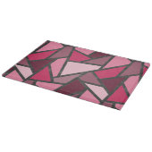 Schaduwen van roze gekleurd glas snijplank (Hoek)