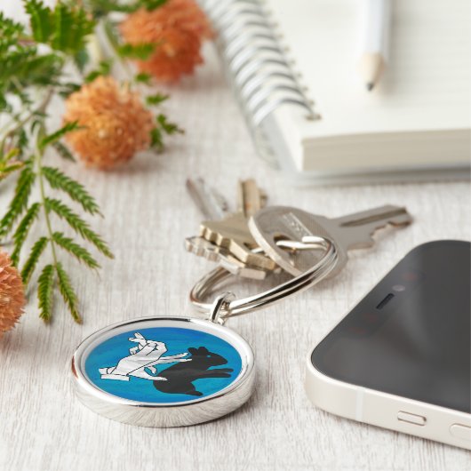 Schaduwkonijn op blauw sleutelhanger (Zijkant)