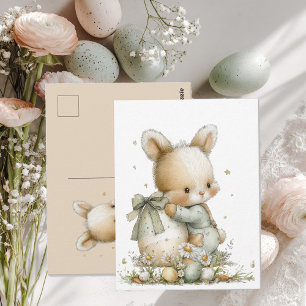 Schattig baby konijn in pyjama met een paasei briefkaart
