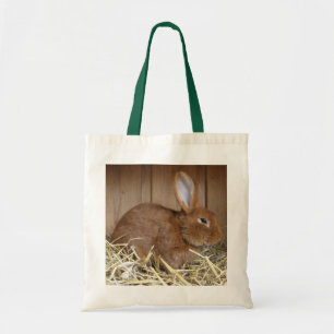 Schattig bruin konijn in vers hooi tote bag