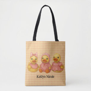 Schattig eendentrio in roze outfits tote bag