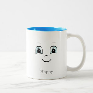 Schattig gelukkig gezicht op wit tweekleurige koffiemok