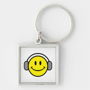 schattig gezicht met koptelefoon sleutelhanger