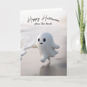 Schattig Halloween spook loopt op een strand Kaart
