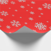 Schattig kerstpatroon witte sneeuwvlokken rood cadeaupapier (Hoek)
