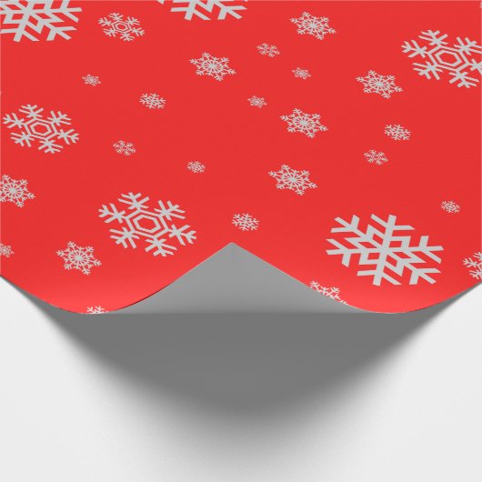 Schattig kerstpatroon witte sneeuwvlokken rood cadeaupapier (Hoek)