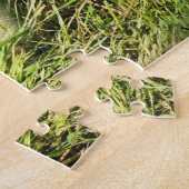 schattig kind in het gras ganzen legpuzzel (Zijkant)