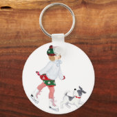 Schattig klein meisje dat skateeg op ijs en hond sleutelhanger (Voorkant)