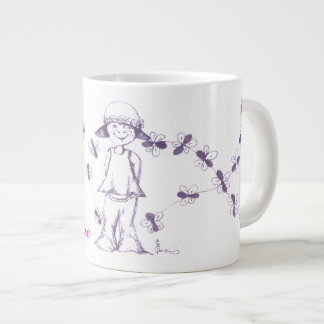 Schattig klein meisje dat tekeningen maakt met bij grote koffiekop