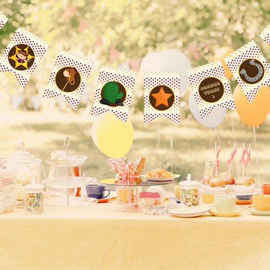 Schattig klein western cowboy leeftijd 1 jaar vlaggetjes