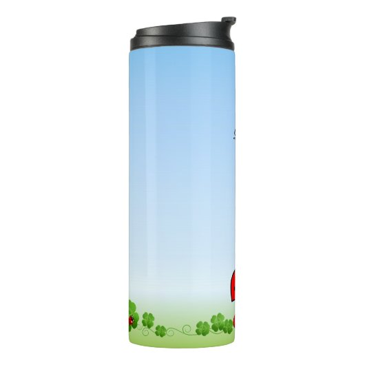 Schattig lieveheersbeestje, vier-blad klavers op l thermosbeker (Gedraaid links)