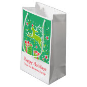 Schattig rendier dat over kerstcadeautas springt klein cadeauzakje (Achterkant Gekanteld)