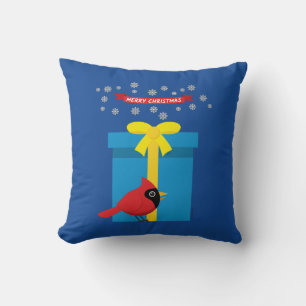 Schattig rood kardinaal met blauw cadeau kussen
