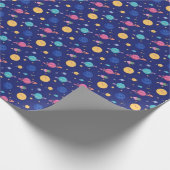 Schattig ruimteontwerp: lachende planeten en schie cadeaupapier (Hoek)