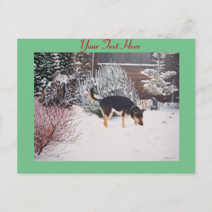 Schattig zwart en tan hond winter sneeuwscène briefkaart