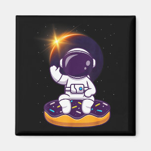 Schattige astronaut totale zonsverduistering donut magneet