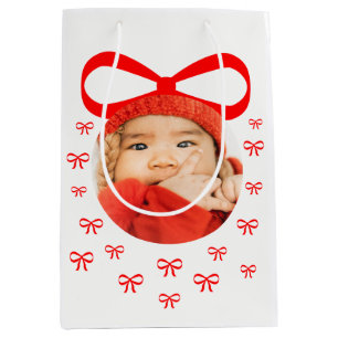 Schattige Baby eerste kerstfoto met rode bogen Medium Cadeauzakje