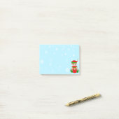 Schattige baby elf & lichte bollen op lichtblauw post-it® notes (Op bureau)
