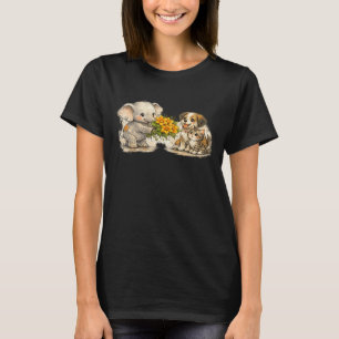 Schattige babyolifant die pompoenbloemen geeft aan t-shirt