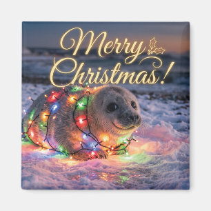 Schattige babyzeehond gewikkeld in kerstlichtjes magneet