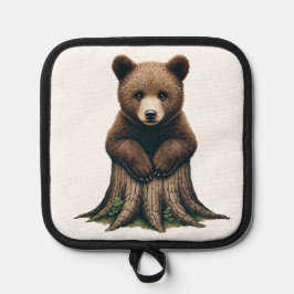 Schattige Beren welp zittend op boomstronk Pannenlap