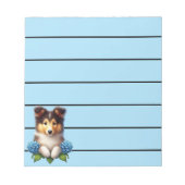 Schattige Collie Puppy met blauwe bloemen Notitieblok (Voorkant)