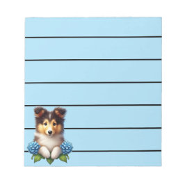 Schattige Collie Puppy met blauwe bloemen Notitieblok