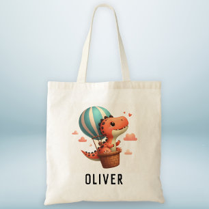 Schattige Dino vliegt in een hete luchtballon Tote Bag