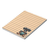 Schattige Doberman puppy spelen met een bal Notitieblok (Linkerzijde)