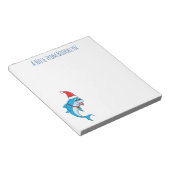 Schattige dolfijn met kerstmuts cartoon notitieblok (Schuin)