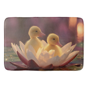Schattige eendjes in een waterleliebloem badmat
