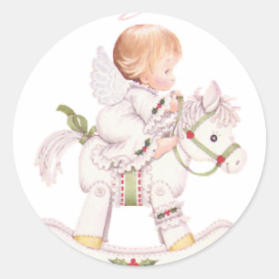 Schattige engel op een wit kerst schommelpaard ronde sticker