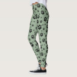 Schattige Fun Black op Sage Green Paw Prints Leggings<br><div class="desc">Deze leuke leggings zijn ideaal voor honden- en kattenliefhebbers. Ze hebben een schattig patroon met zwarte pootafdrukken verspreid over een lichte salie groen gekleurde achtergrond. Leuk grillig design is ideaal voor ouders en dierenvrienden.</div>