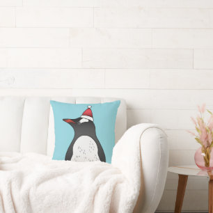 Schattige Gentoo-pinguïn met een kerstmuts op een Kussen