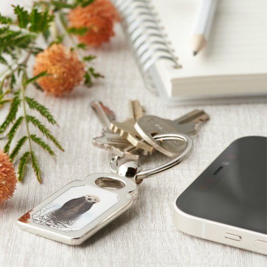 Schattige glimlende Otter in het meer Sleutelhanger (Zijkant)