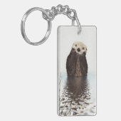 Schattige glimlende Otter in het meer Sleutelhanger (Voorkant Links)
