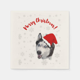 Schattige grappig lachende Husky in Santa Claus ro Servet