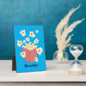 Schattige grappige springende popcorn-cartoon fotoplaat (Zijkant)