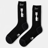 Schattige grappige witte kat & poten op zwart sokken (Links)