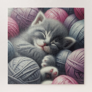 Schattige grijs en wit kitten napping in garen legpuzzel