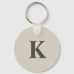 Schattige grijs monogram sleutelhanger