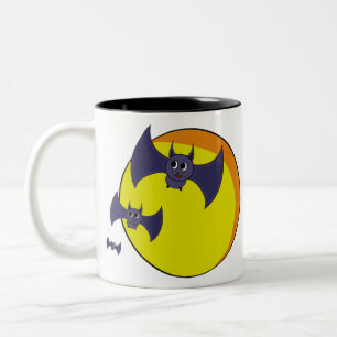 Schattige Halloween-vleermuizen en een mooie volle Tweekleurige Koffiemok