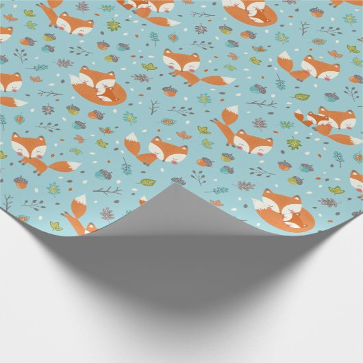 Schattige herfst mama en baby vos op blauw cadeaupapier (Hoek)
