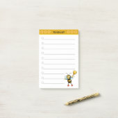 Schattige honingbij op wit post-it® notes (Op bureau)