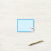 Schattige ijsbeer cartoon op lichtblauw post-it® notes (Op bureau)