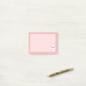 Schattige ijsbeer op lichtroze post-it® notes (Op bureau)