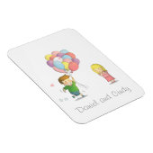 Schattige jongen deelt zijn liefde voor meisje met magneet (Rechterzijde)