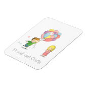 Schattige jongen deelt zijn liefde voor meisje met magneet (Linkerzijde)